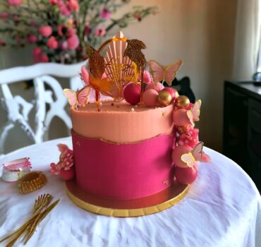 pink cake with butterflies